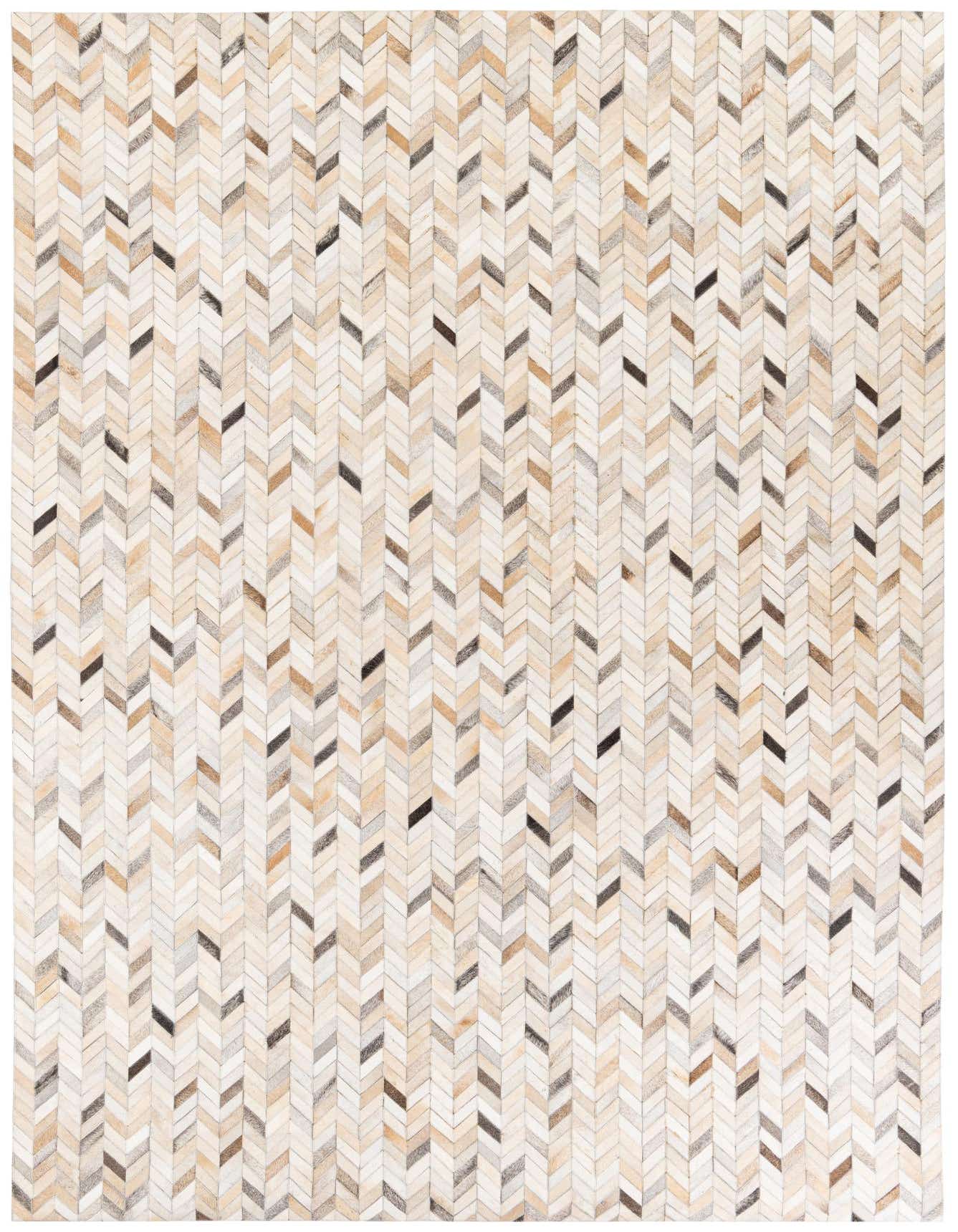 A rectangular 7x10 multi-colored cowhide rug featuring a modern chevron pattern in various shades of brown, beige, and cream.
