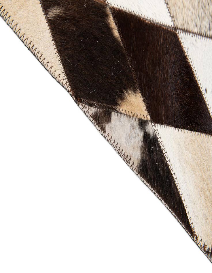 Detail image of  6' 6 x 9' 10 Cowhide Stocks Rug