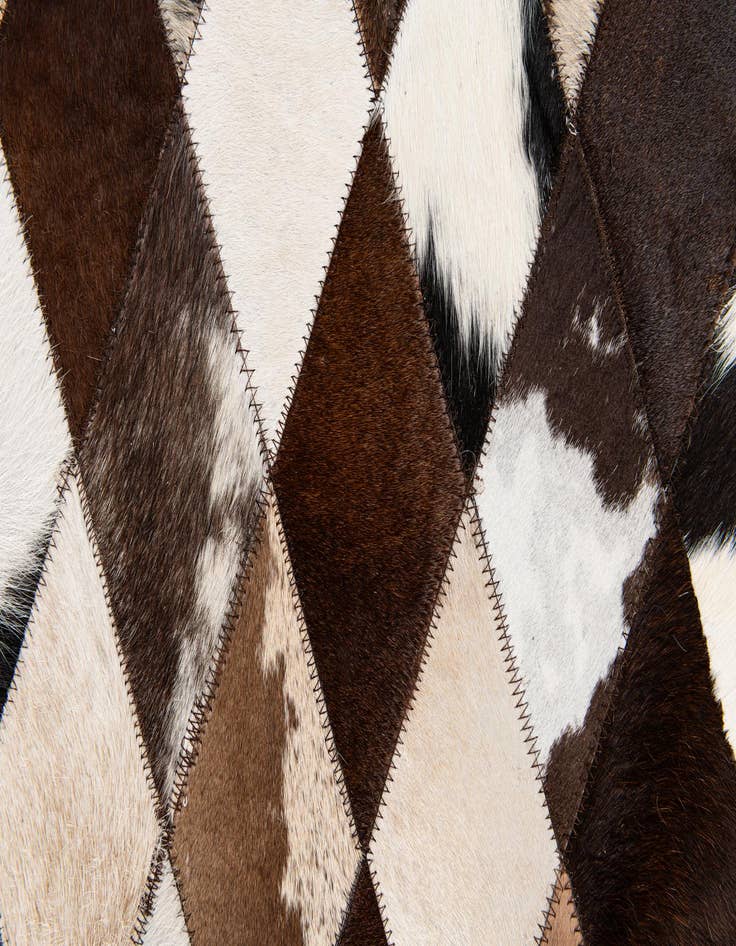Detail image of  6' 6 x 9' 10 Cowhide Stocks Rug