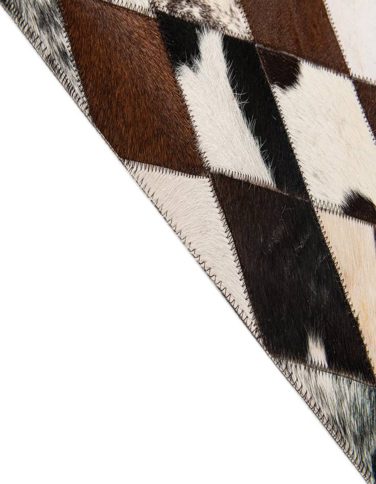 Detail image of  6' 7 x 9' 10 Cowhide Stocks Rug