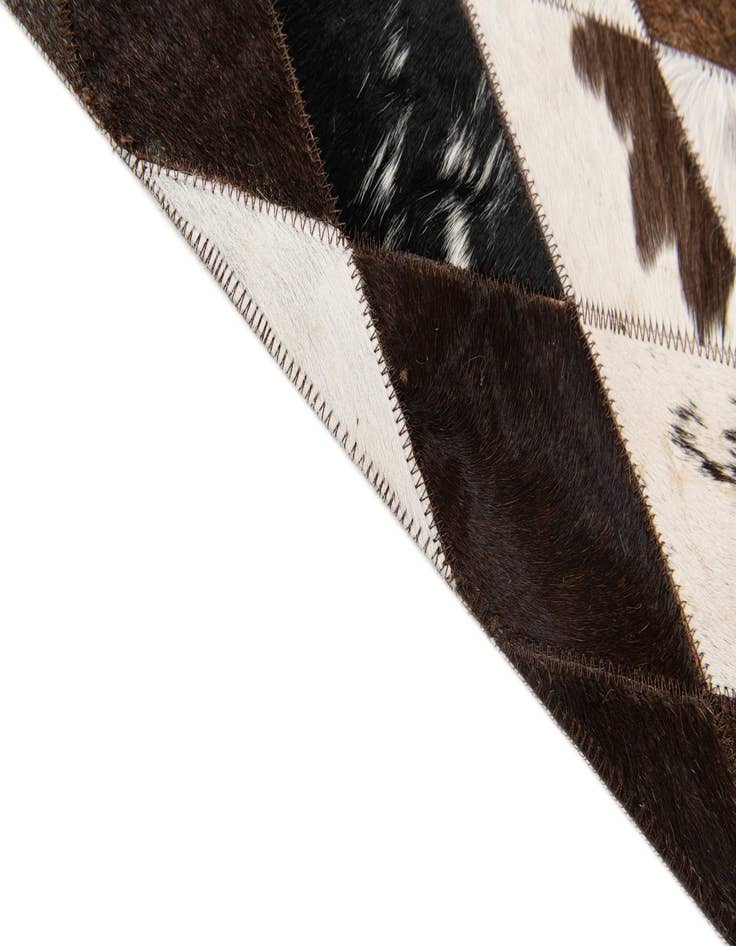 Detail image of  6' 9 x 9' 11 Cowhide Stocks Rug