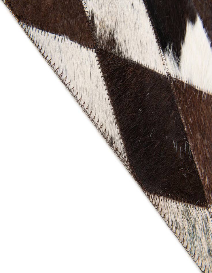 Detail image of  6' 8 x 9' 9 Cowhide Stocks Rug
