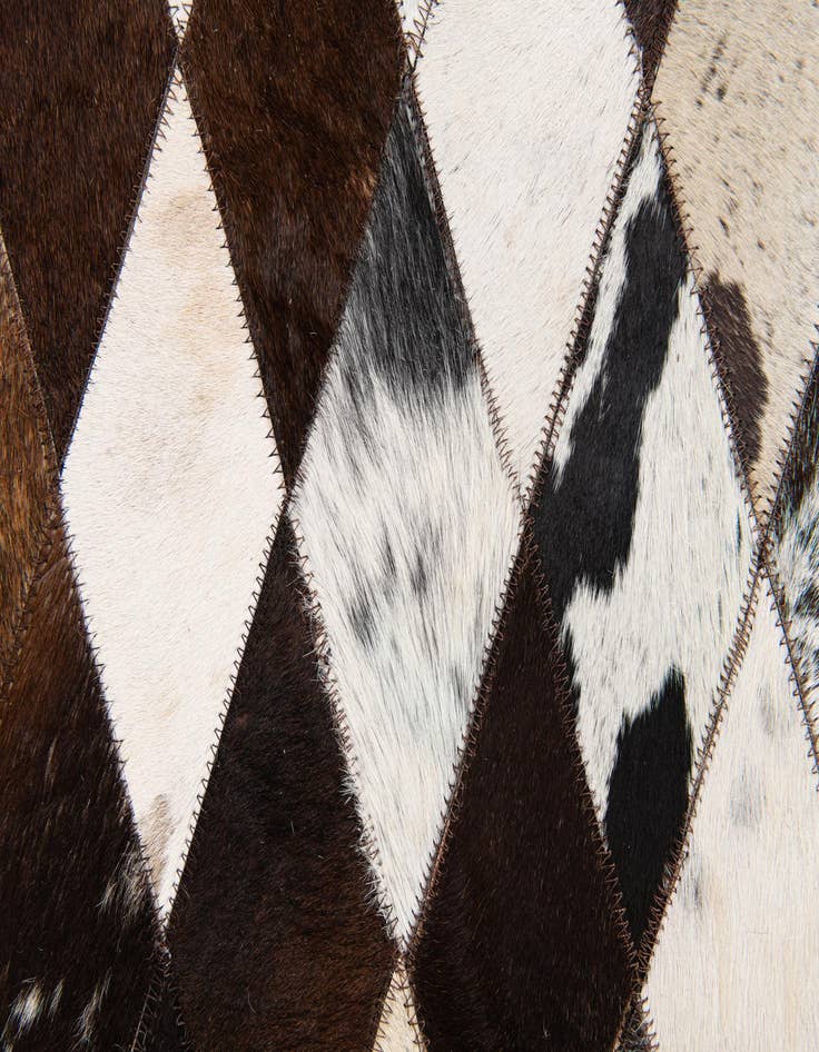 Detail image of  6' 9 x 9' 11 Cowhide Stocks Rug