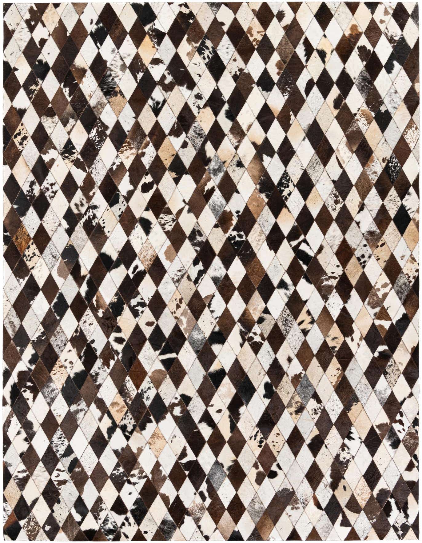 A 7x10 rectangular rug featuring a modern diamond pattern made from multi-colored cowhide patches in various brown, black, and white tones.