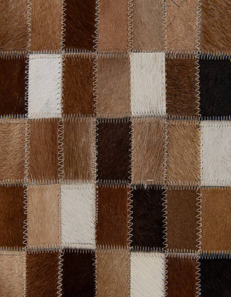 Detail image of  6' 8 x 9' 10 Cowhide Stocks Rug
