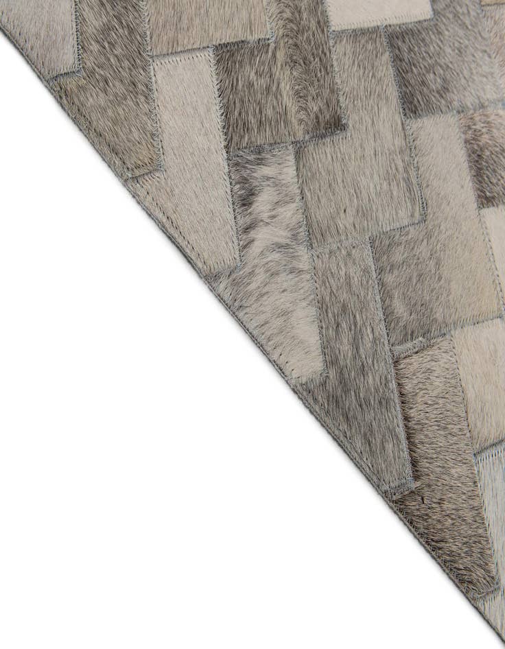 Detail image of  6' 7 x 9' 10 Cowhide Stocks Rug
