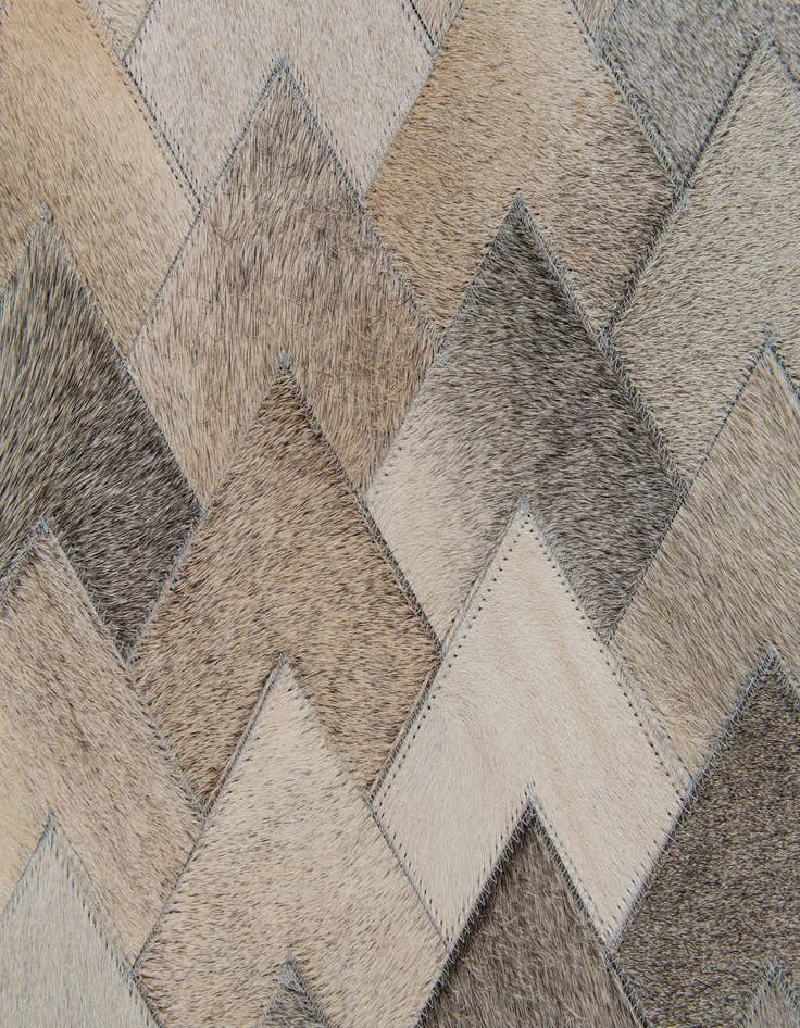 Detail image of  6' 7 x 9' 10 Cowhide Stocks Rug