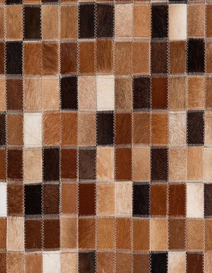 Detail image of  6' 8 x 9' 11 Cowhide Stocks Rug