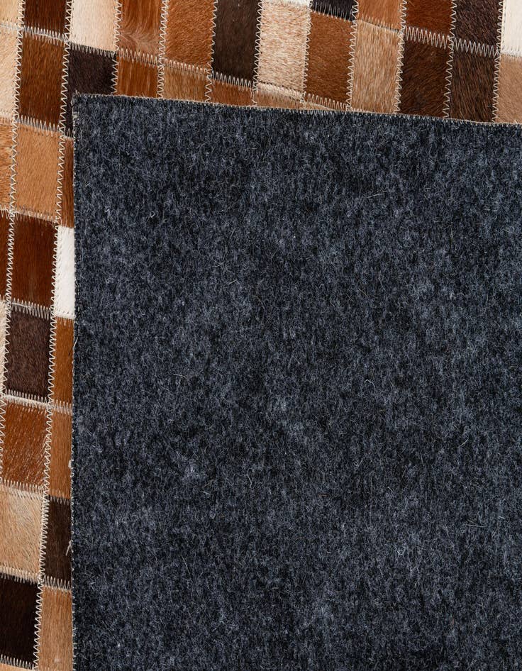 Detail image of  6' 7 x 9' 9 Cowhide Stocks Rug