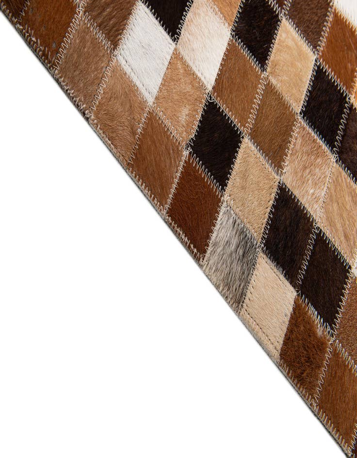 Detail image of  6' 8 x 9' 10 Cowhide Stocks Rug