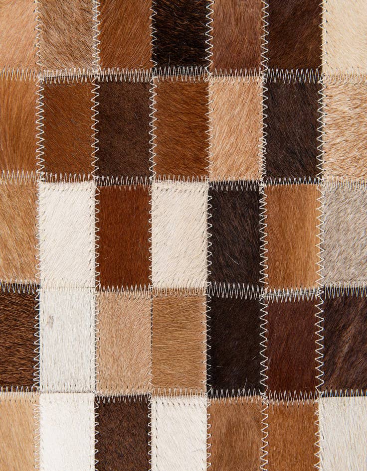 Detail image of  6' 8 x 9' 10 Cowhide Stocks Rug