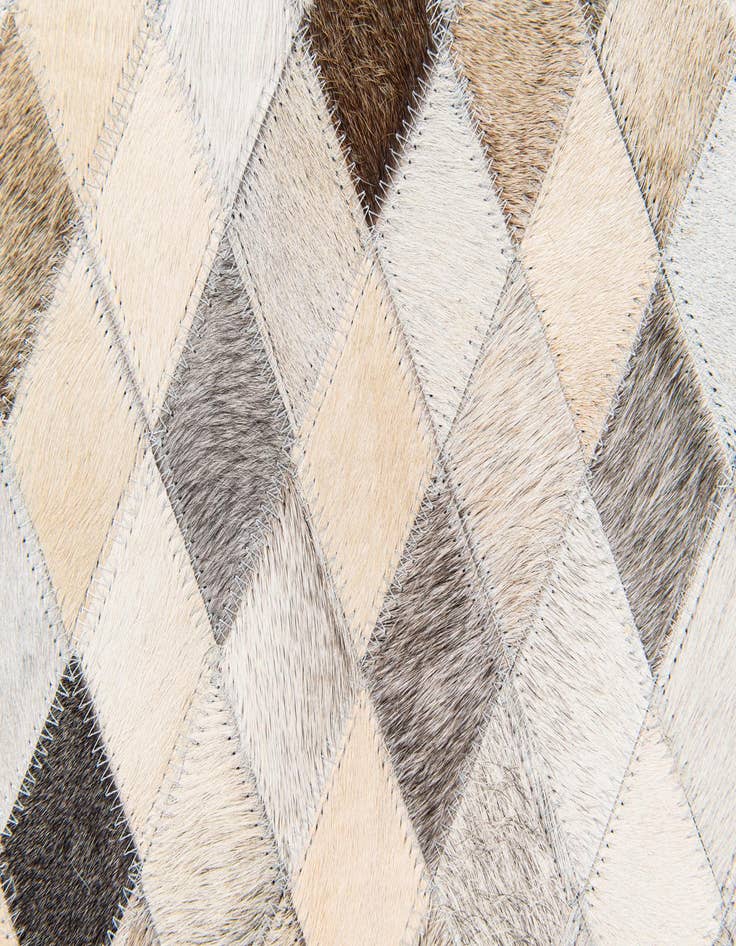 Detail image of  6' 7 x 9' 11 Cowhide Stocks Rug