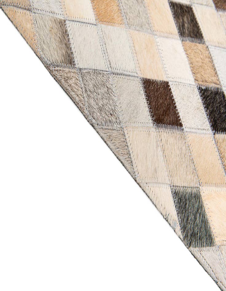 Detail image of  6' 7 x 9' 11 Cowhide Stocks Rug