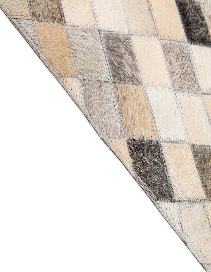 Detail image of  6' 8 x 9' 11 Cowhide Stocks Rug