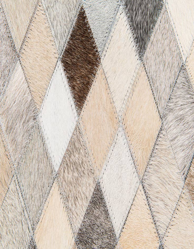 Detail image of  6' 8 x 9' 11 Cowhide Stocks Rug