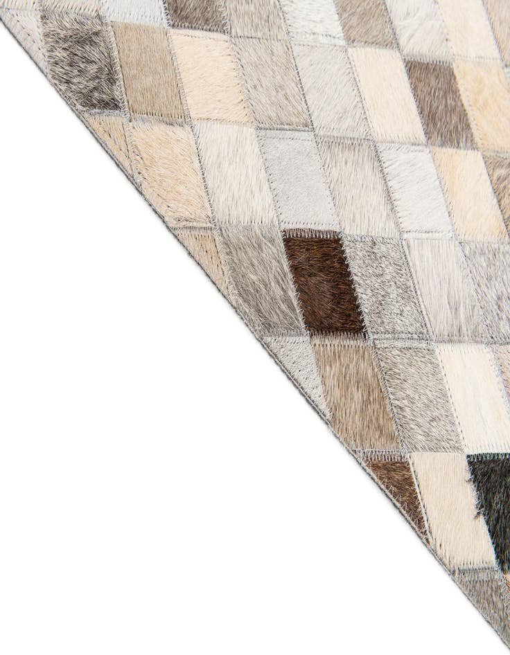 Detail image of  6' 8 x 9' 9 Cowhide Stocks Rug