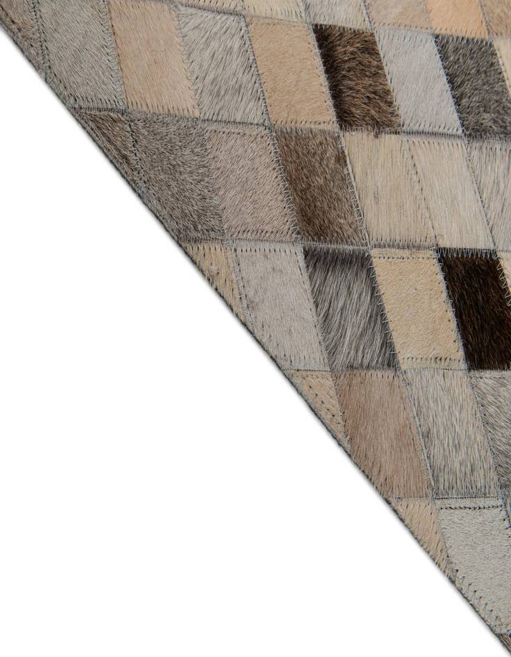 Detail image of  6' 9 x 9' 10 Cowhide Stocks Rug