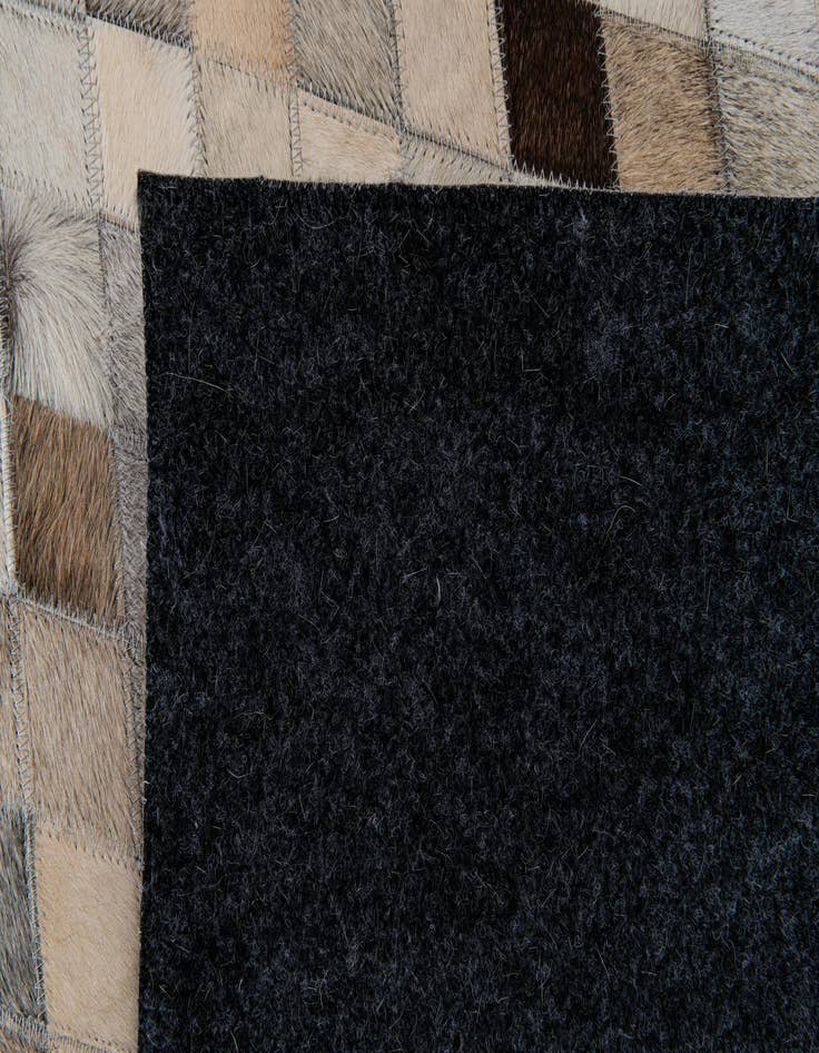 Detail image of  6' 9 x 9' 10 Cowhide Stocks Rug