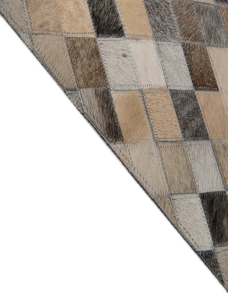 Detail image of  6' 7 x 9' 11 Cowhide Stocks Rug