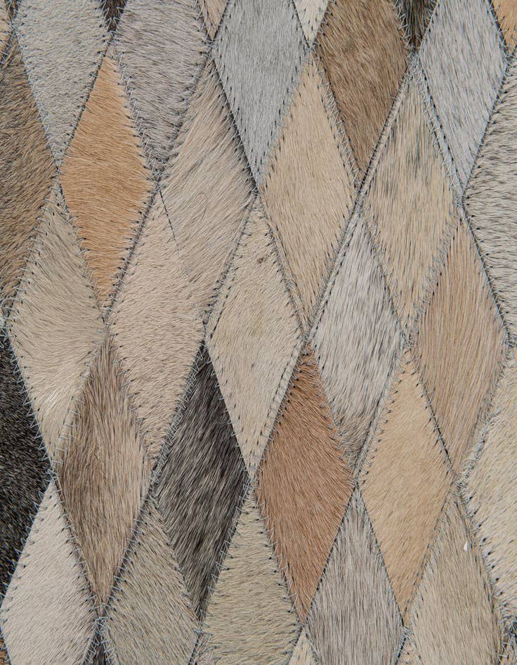 Detail image of  6' 7 x 9' 11 Cowhide Stocks Rug