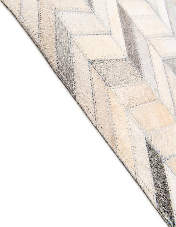 Detail image of  6' 8 x 9' 10 Cowhide Stocks Rug
