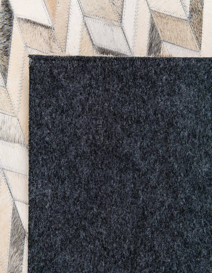 Detail image of  6' 7 x 10' Cowhide Stocks Rug
