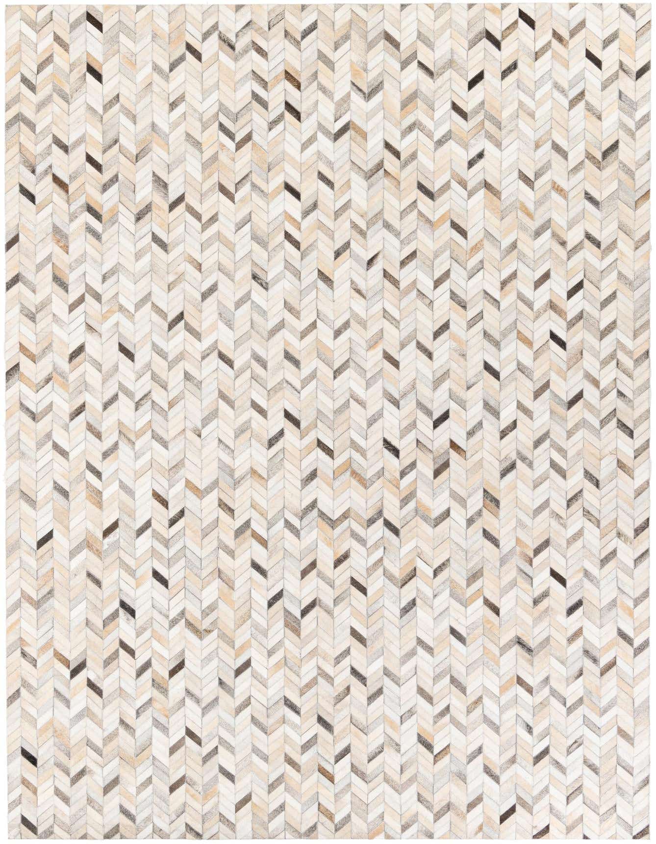 A 7x10 rectangular Cowhide Stocks rug featuring a modern chevron pattern in multi-colored natural cowhide and leather.