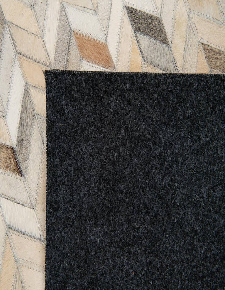 Detail image of  6' 9 x 9' 10 Cowhide Stocks Rug
