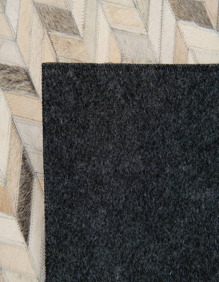 Detail image of  6' 9 x 9' 11 Cowhide Stocks Rug