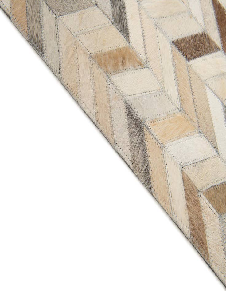 Detail image of  6' 8 x 9' 10 Cowhide Stocks Rug