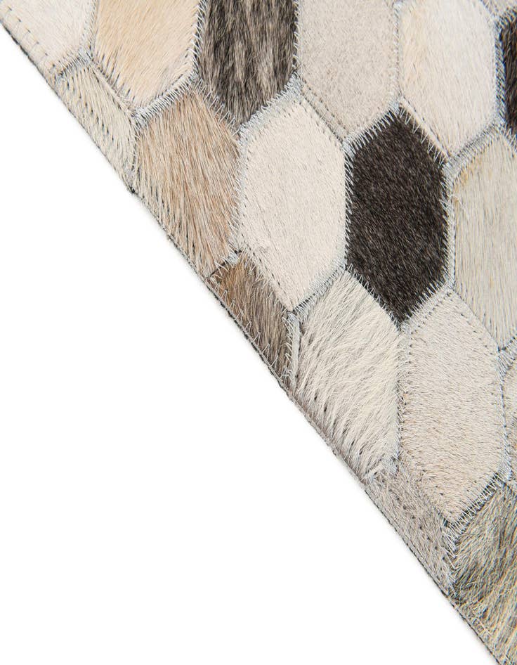 Detail image of  6' 7 x 10' 1 Cowhide Stocks Rug
