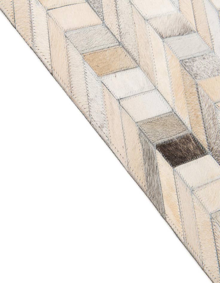 Detail image of  6' 8 x 9' 11 Cowhide Stocks Rug