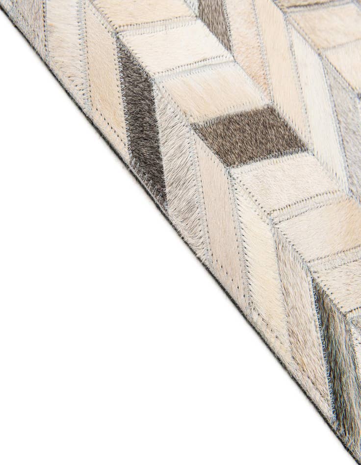 Detail image of  6' 7 x 9' 10 Cowhide Stocks Rug