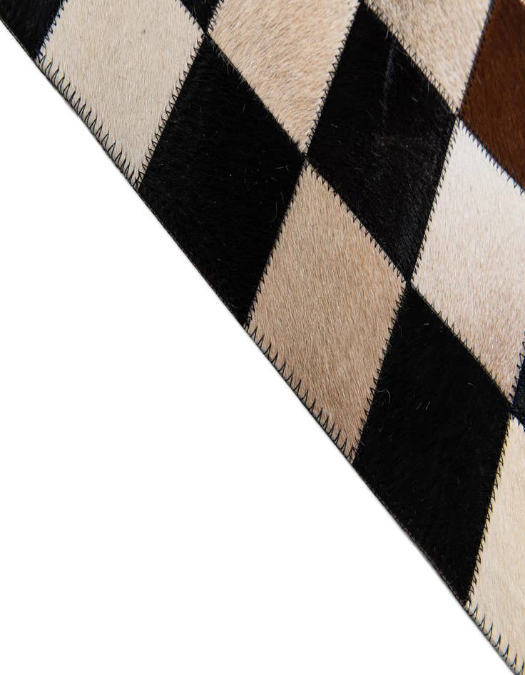 Detail image of  4' 9 x 6' 7 Cowhide Stocks Rug