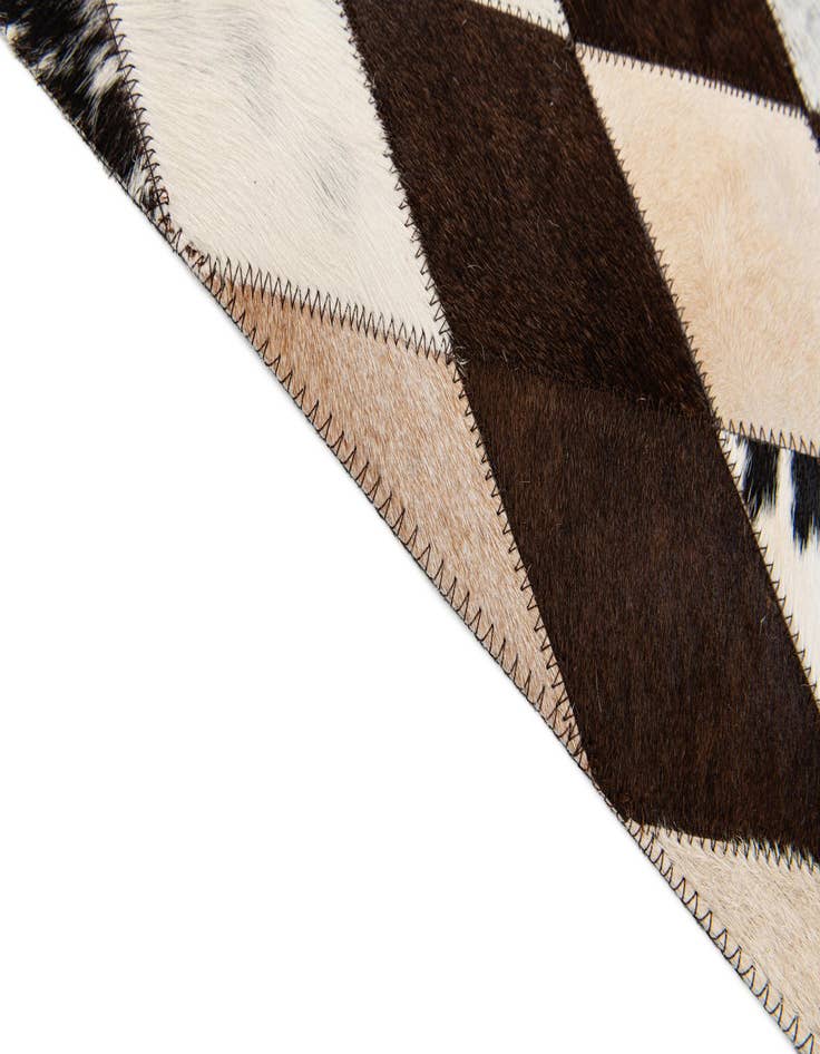 Detail image of  4' 8 x 6' 9 Cowhide Stocks Rug