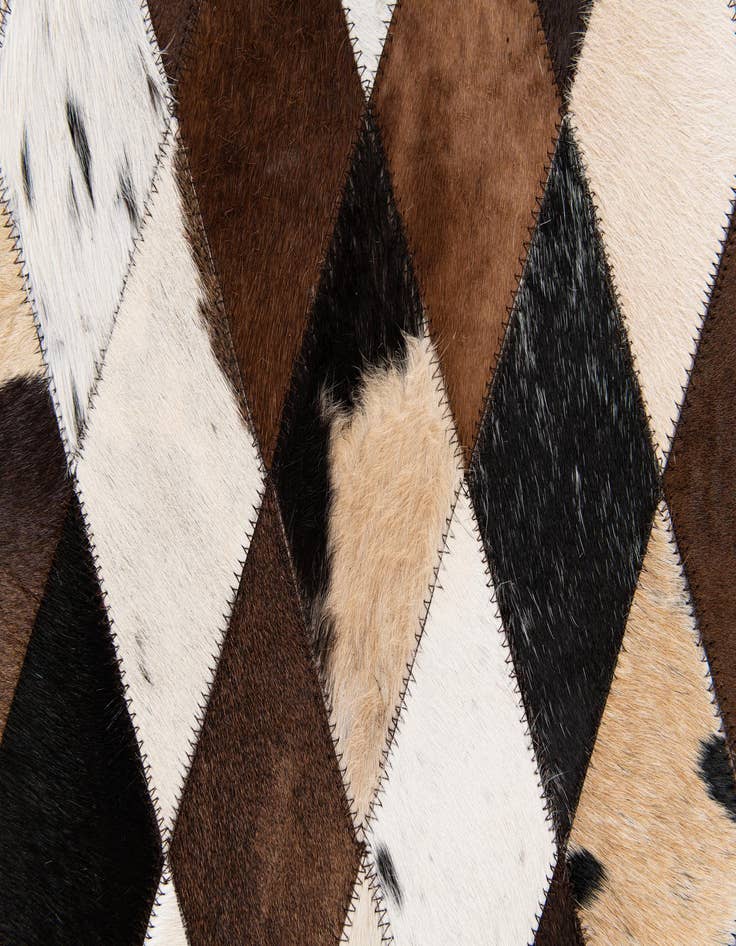 Detail image of  4' 8 x 6' 9 Cowhide Stocks Rug