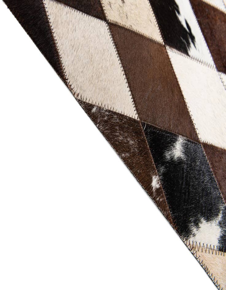 Detail image of  4' 8 x 6' 9 Cowhide Stocks Rug