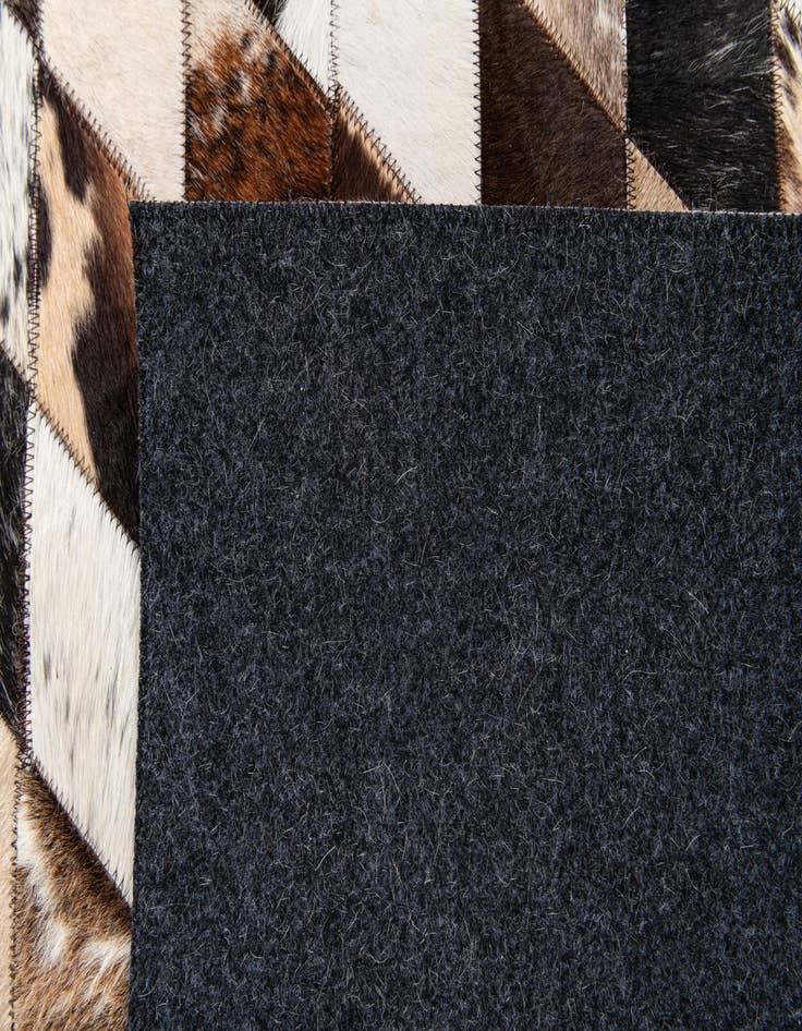 Detail image of  4' 8 x 6' 9 Cowhide Stocks Rug