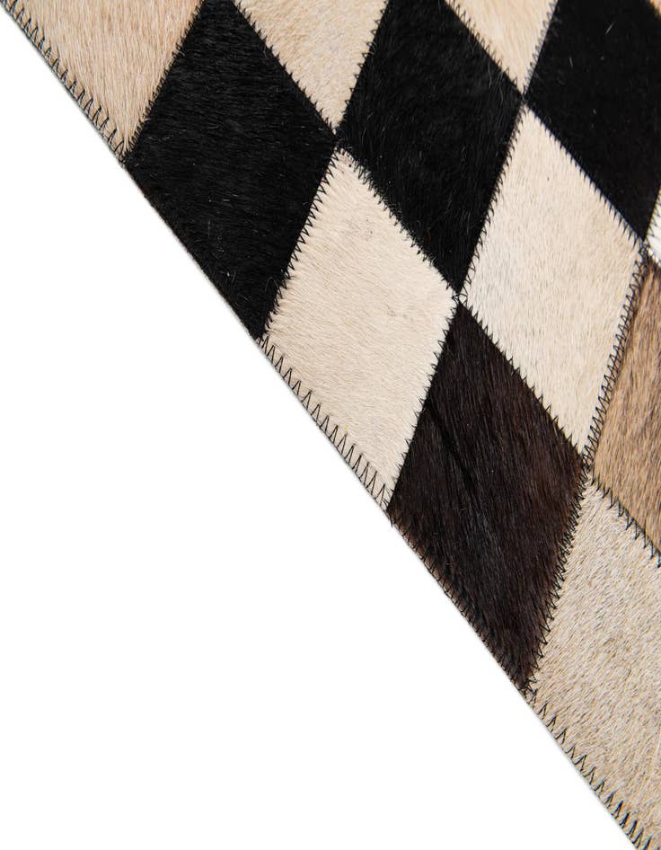 Detail image of  4' 8 x 6' 8 Cowhide Stocks Rug
