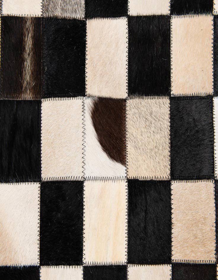 Detail image of  4' 8 x 6' 8 Cowhide Stocks Rug
