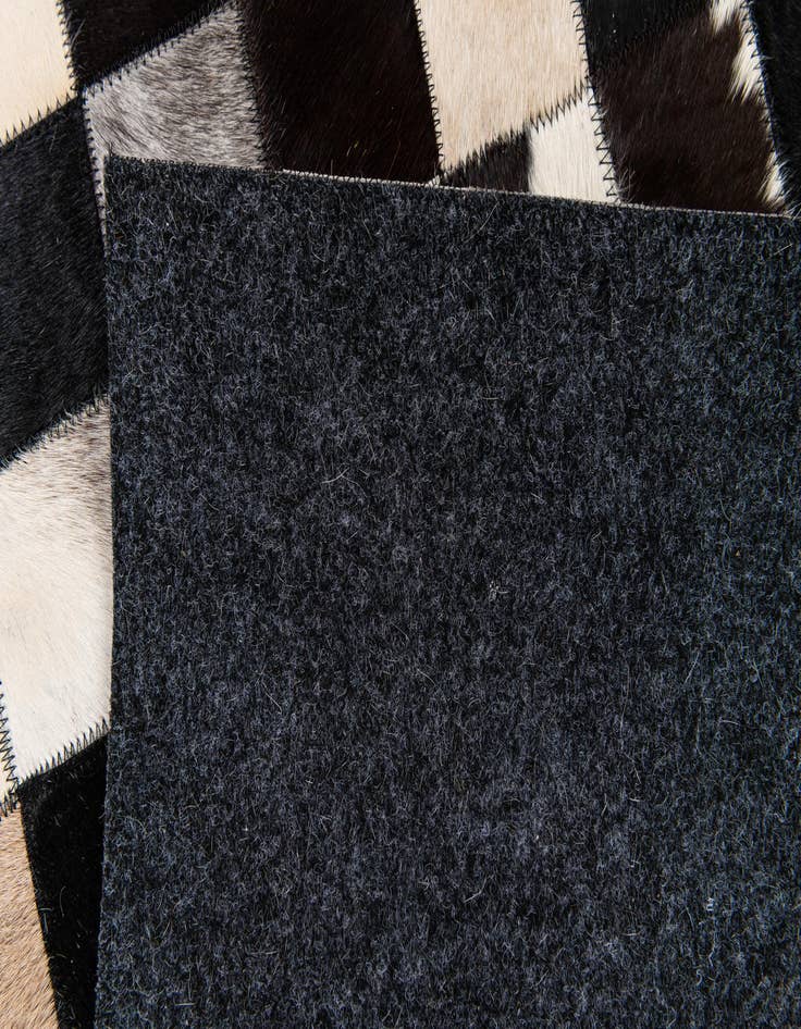 Detail image of  4' 8 x 6' 8 Cowhide Stocks Rug