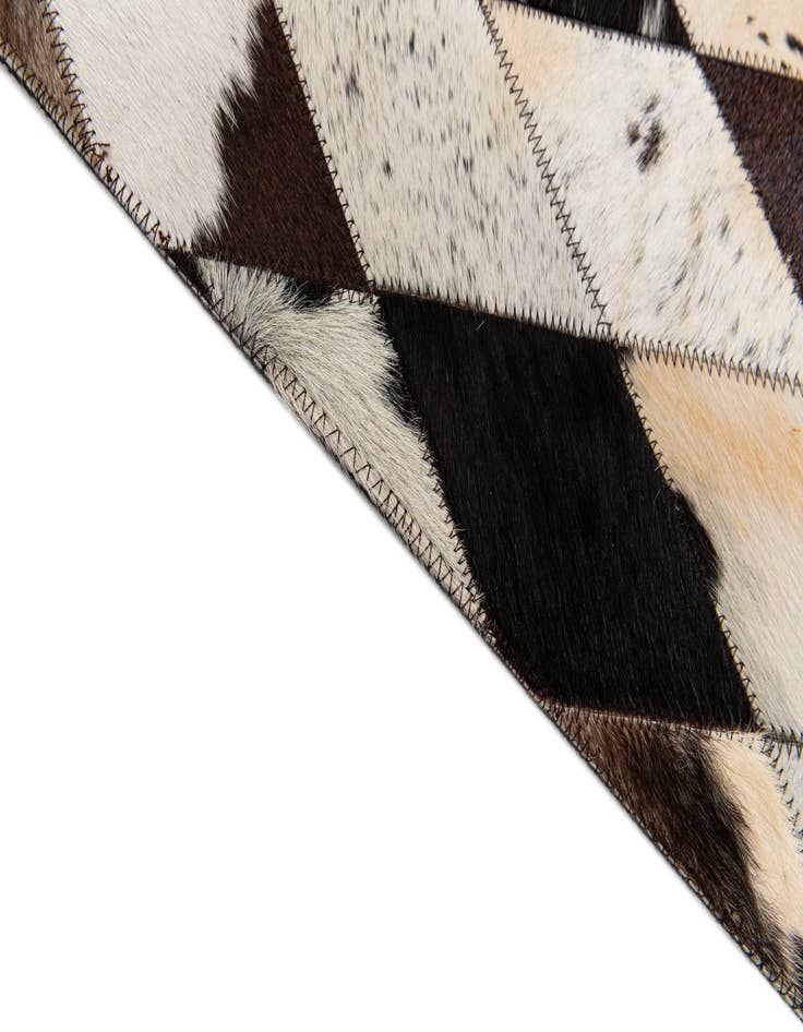 Detail image of  4' 8 x 6' 9 Cowhide Stocks Rug