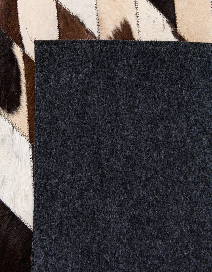 Detail image of  4' 8 x 6' 9 Cowhide Stocks Rug