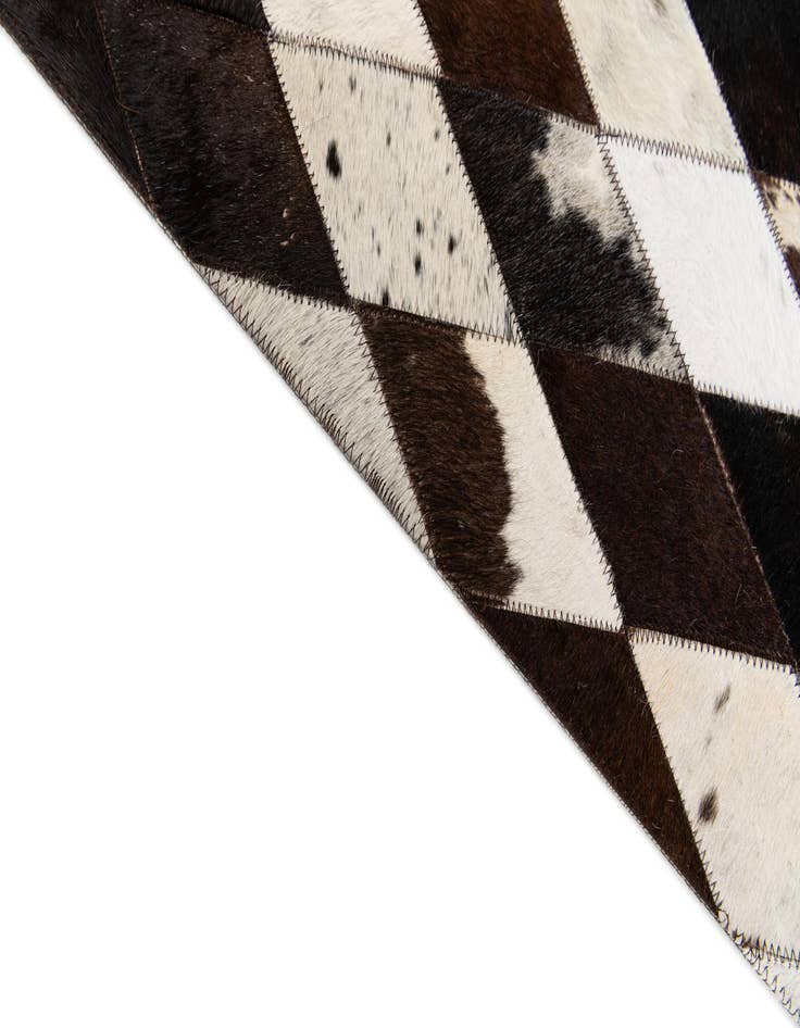 Detail image of  4' 8 x 6' 9 Cowhide Stocks Rug