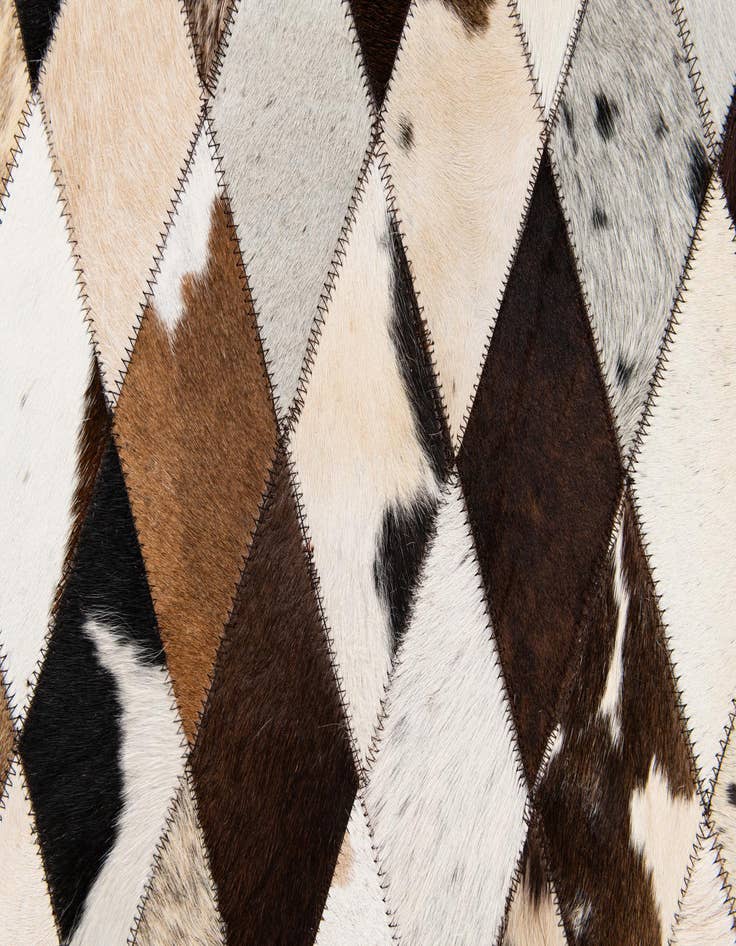 Detail image of  4' 8 x 6' 9 Cowhide Stocks Rug