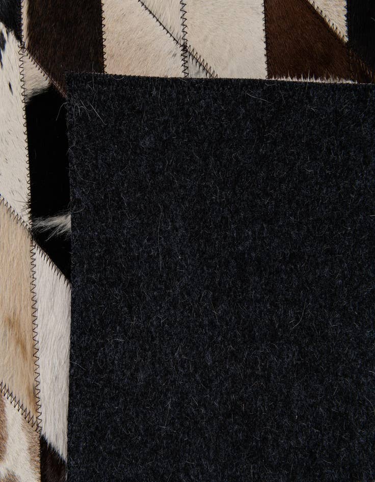 Detail image of  4' 9 x 6' 9 Cowhide Stocks Rug