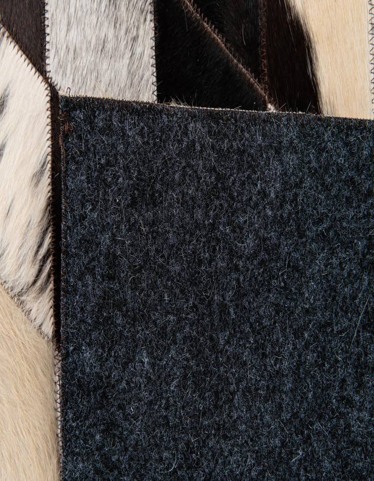 Detail image of  4' 8 x 6' 8 Cowhide Stocks Rug