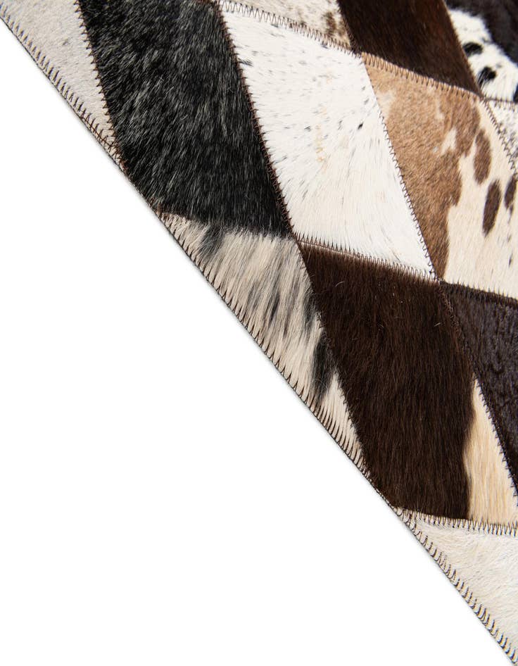 Detail image of  4' 8 x 6' 8 Cowhide Stocks Rug