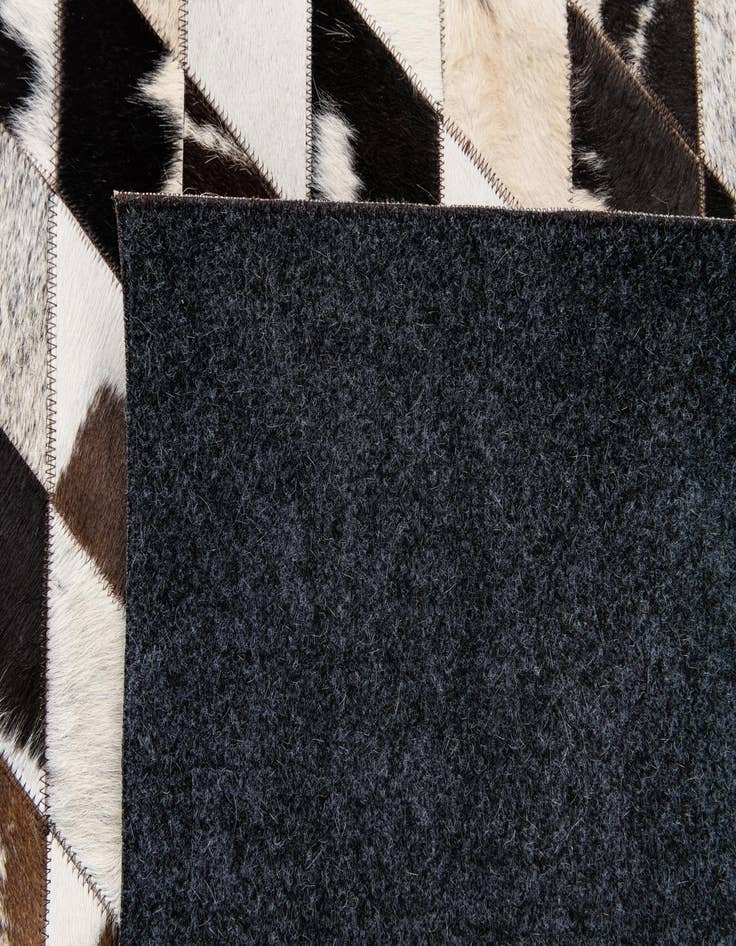 Detail image of  4' 8 x 6' 8 Cowhide Stocks Rug