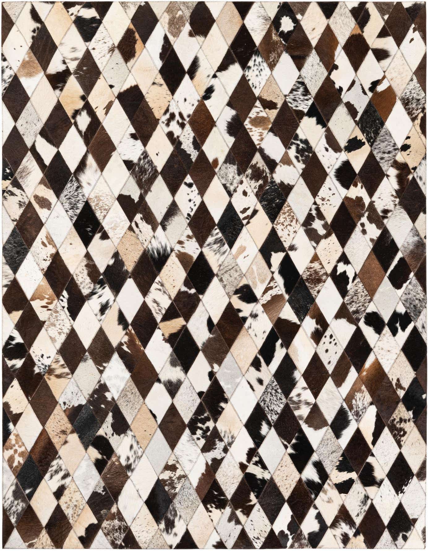A 5x7 rectangular rug made from multi-colored cowhide and leather patches arranged in a modern diamond pattern.